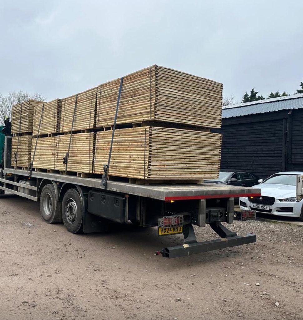 Newly manufactured fence panels heading out for delivery to a local customer